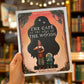 The Café at the Edge of the Woods – Mikey Please