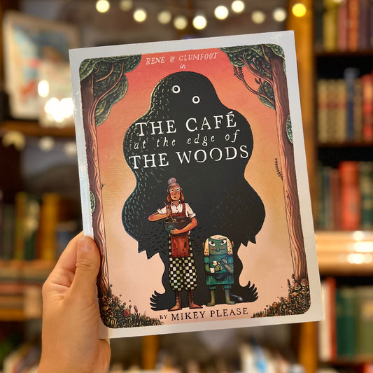 The Café at the Edge of the Woods – Mikey Please