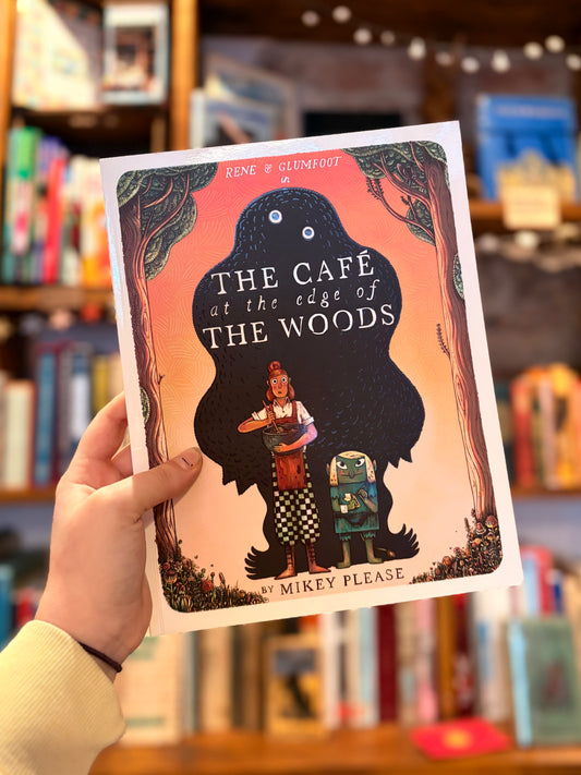 The Café at the edge of the Woods - Mikey Please